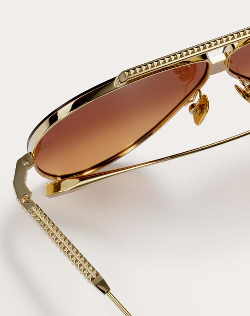 Aviator sunglasses store with gold studs