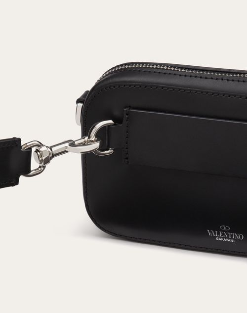 Black VLTN-print leather cross-body bag, Valentino Garavani
