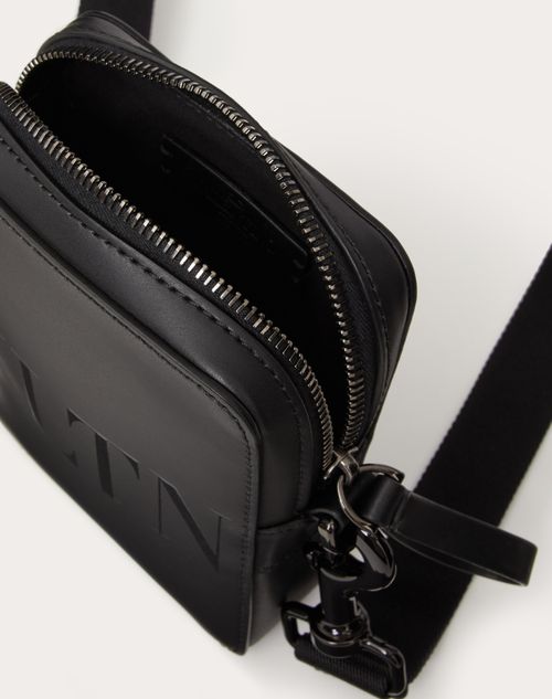 Black VLTN-print leather cross-body bag, Valentino Garavani