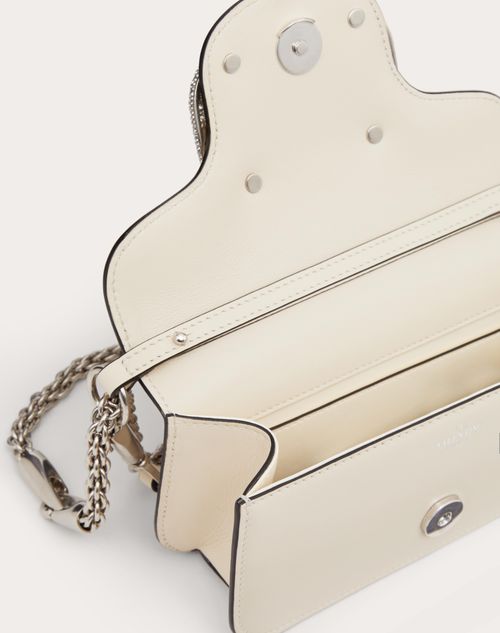 Valentino Garavani Locò Small Shoulder Bag With Jewel Logo in Natural