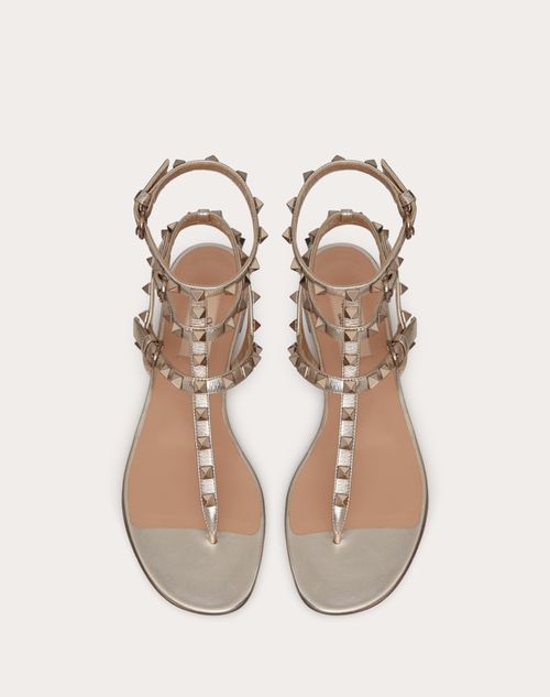 Rockstud Metallic Flat Flip-flop Sandal for Woman in Skin | Valentino US
