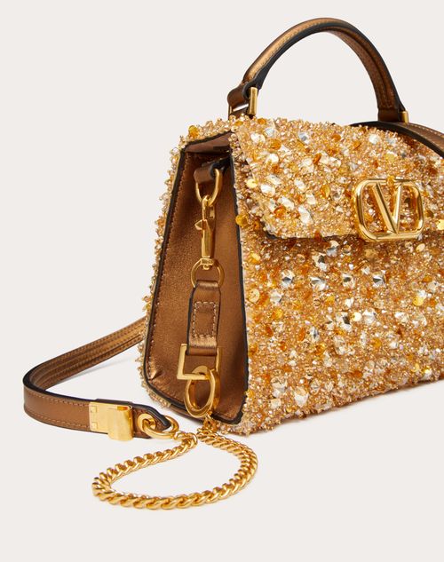 gold valentino handbag