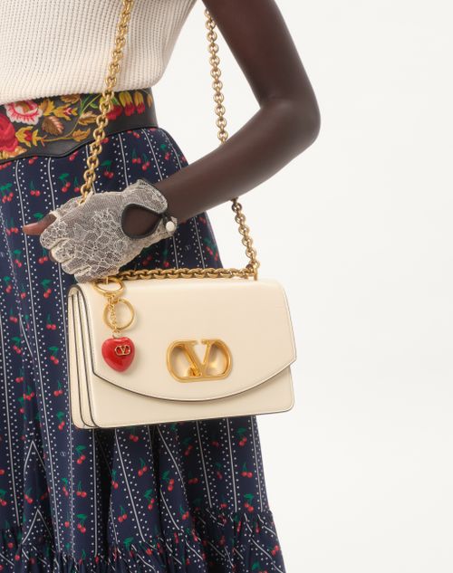 Valentino Garavani - Coeur Royal Bag Charm With Key Ring In Metal And Enamel - Antique Brass/red - Woman - Shelf - W Acc - Keyrings And Bag Charms