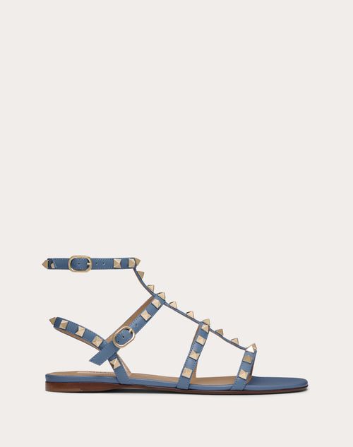 ROCKSTUD FLATFORM SANDAL IN GOLD CALFSKIN