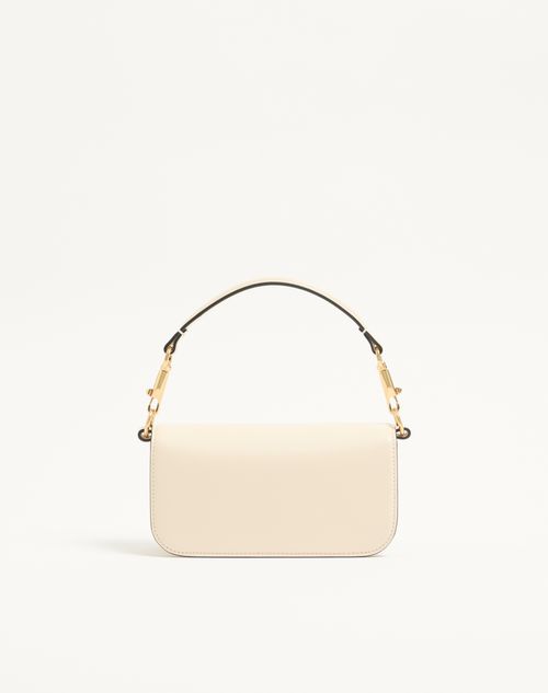 Valentino Garavani - Valentino Garavani Locò Small Shoulder Bag In Calfskin - Light Ivory - Woman - Shoulder Bags