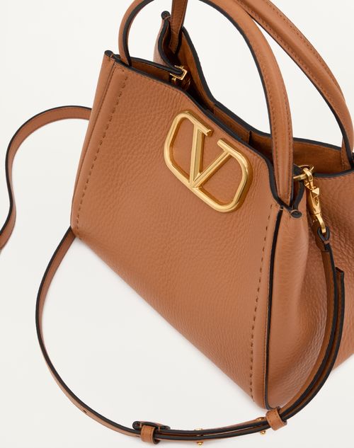 V and a handbags sale