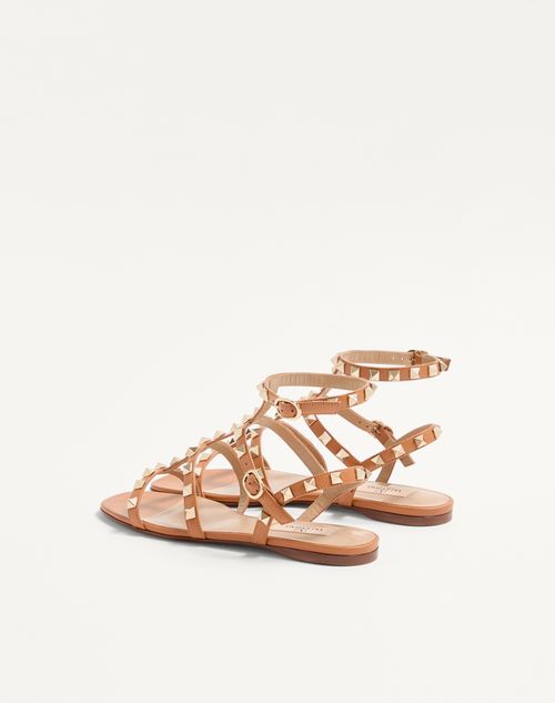 Valentino Garavani - Rockstud Flat Calfskin Sandal With Straps - Almond - Woman - Sandals