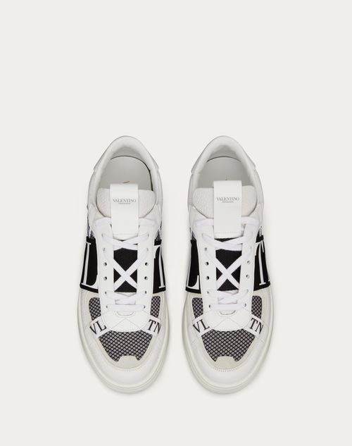 Shop Valentino Garavani Open Skate Calfskin and Fabric Sneakers