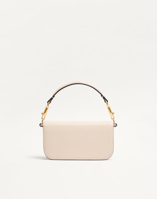 Valentino Garavani - Valentino Garavani Locò Small Shoulder Bag In Calfskin - Light Ivory - Woman - Shoulder Bags