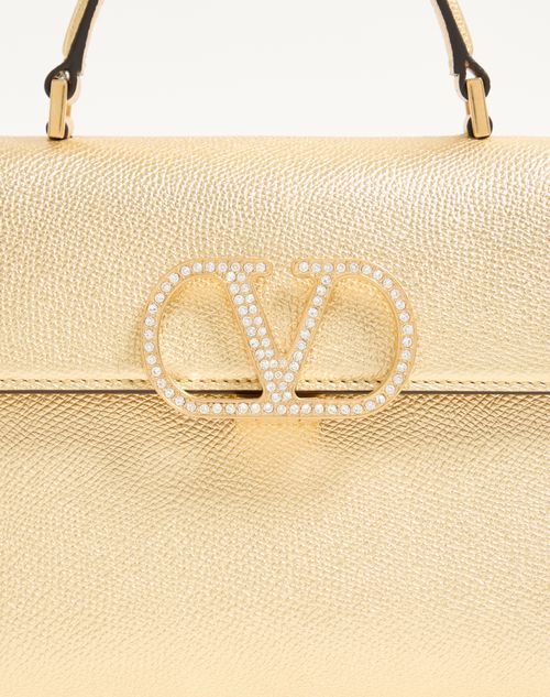 Valentino Garavani - Valentino Garavani Vsling Small Handbag In Laminated Calfskin With Jewel Logo - Antique Brass - Woman - Top Handle Bags