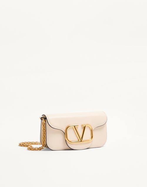 Valentino Garavani - Valentino Garavani Locò Small Shoulder Bag In Calfskin - Light Ivory - Woman - Shoulder Bags