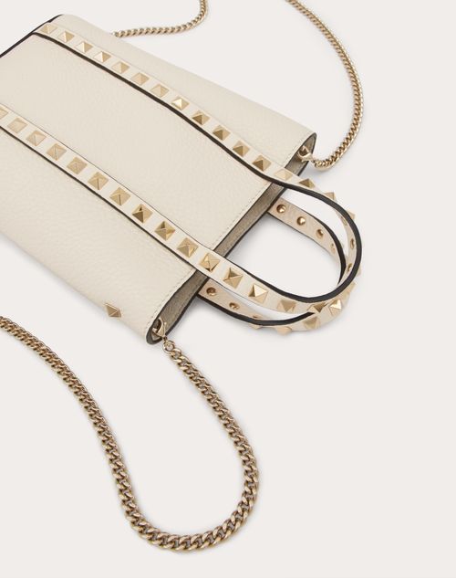 Valentino rockstud best sale leather pouch