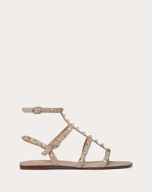 Valentino Garavani - Rockstud Flat Calfskin Sandal With Straps - Poudre - Woman - Rockstud Sandals - Shoes