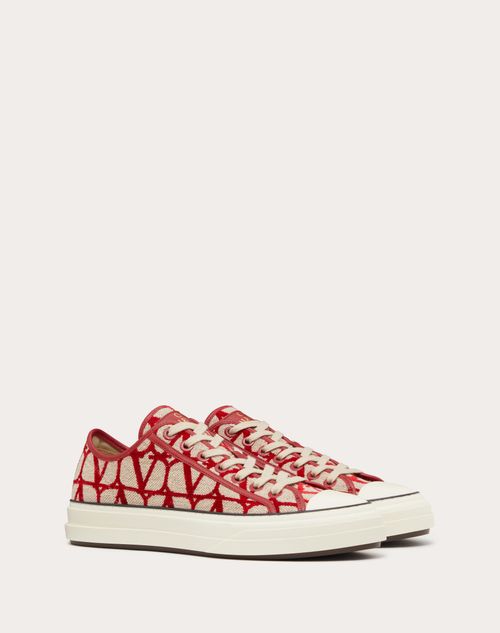 LOW-TOP SNEAKER IN WHITE NAPPA LEATHER AND BLACK TOILE ICONOGRAPHE FABRIC