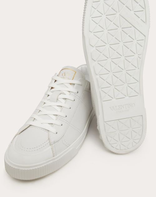 Valentino garavani studded sneakers hotsell