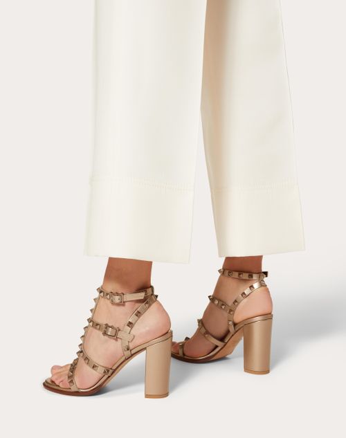 Rockstud Metallic Calfskin Leather Ankle Strap Sandal 90 Mm for Woman in  Skin | Valentino US