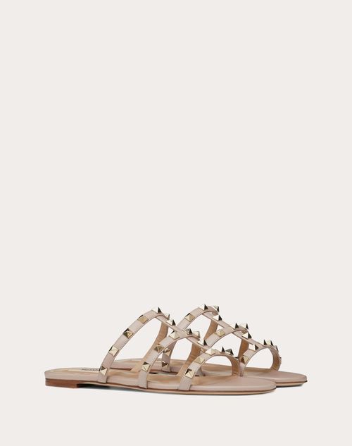 Valentino Garavani - Rockstud Flat Slide Sandal - Poudre - Woman - Slides And Thongs