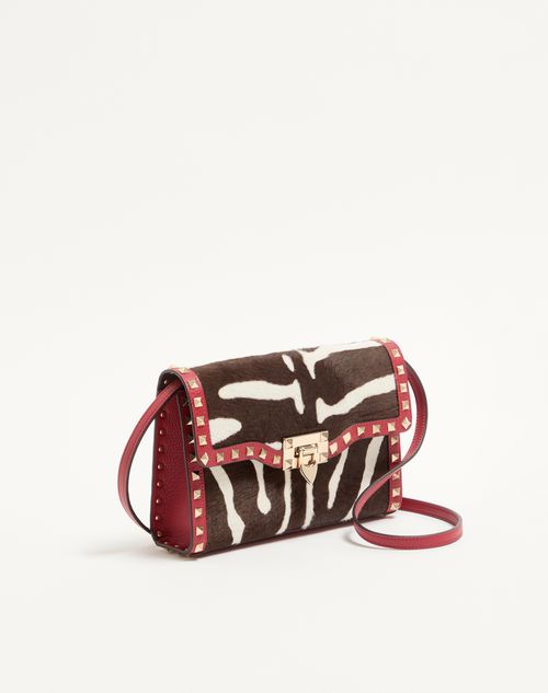 Valentino Garavani - Valentino Garavani Rockstud Small Shoulder Bag In Pony-effect Calfskin - White/marrone/red - Woman - Shoulder Bags