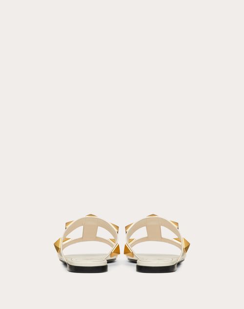 roman stud flat mule in calfskin
