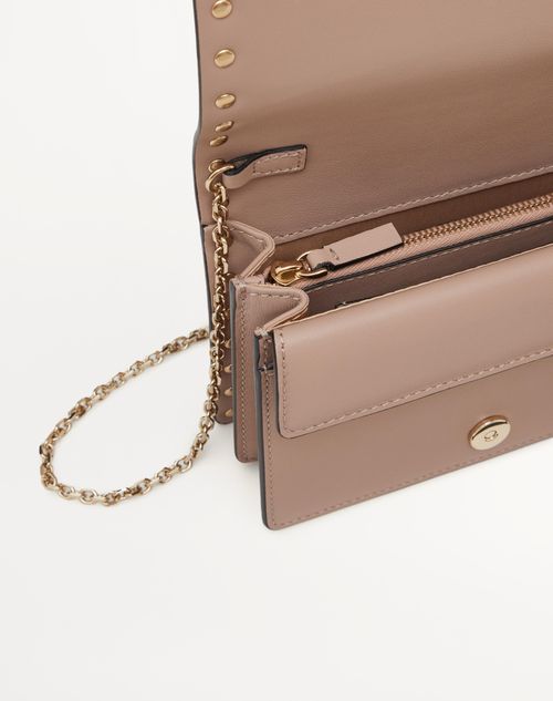 Rockstud Calfskin Chain Pouch by Valentino Garavani at ORCHARD MILE