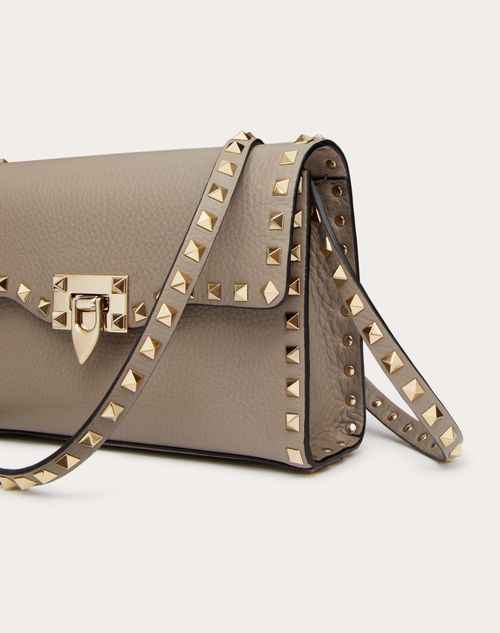 Small Rockstud Grainy Calfskin Crossbody Bag for Woman in Dove