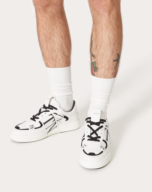 Vl7n Calfskin Sneaker With Bands Man in White/ Black | Valentino