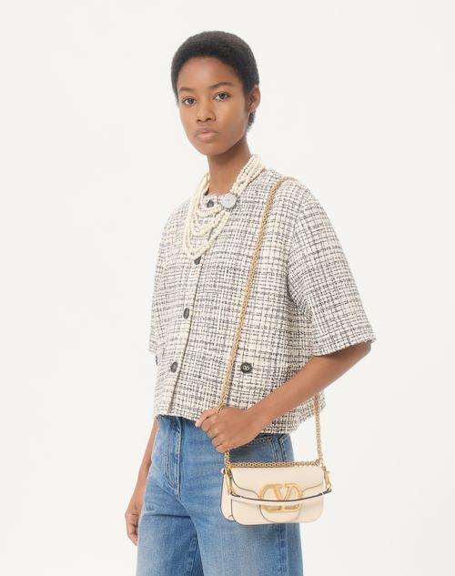 Valentino Garavani - Valentino Garavani Locò Small Shoulder Bag In Calfskin - Light Ivory - Woman - Shoulder Bags