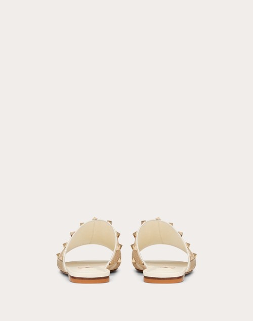 Rockstud Slider Sandal In Raffia With Cornerly Embroidery for Woman in  Ivory | Valentino US