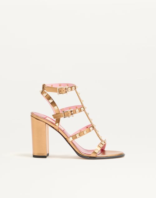 Valentino Garavani - Rockstud Laminated Calfskin Sandal With Straps 90mm - Gold - Woman - Sandals
