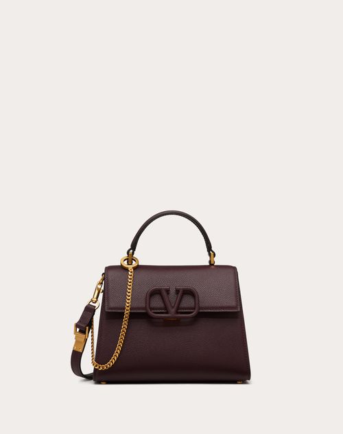 Valentino Garavani VSLING bag. Small textured leather shoulder bag. 