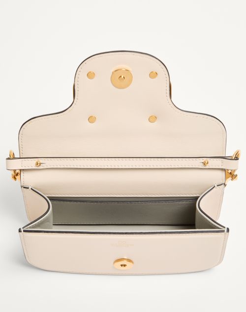 Valentino Garavani - Valentino Garavani Locò Small Shoulder Bag In Calfskin - Light Ivory - Woman - Shoulder Bags