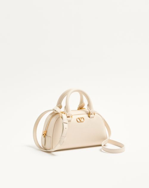 Valentino Garavani - Mini Vlogo Signature Bowling Bag In Grainy Calfskin - Light Ivory - Woman - Top Handle Bags