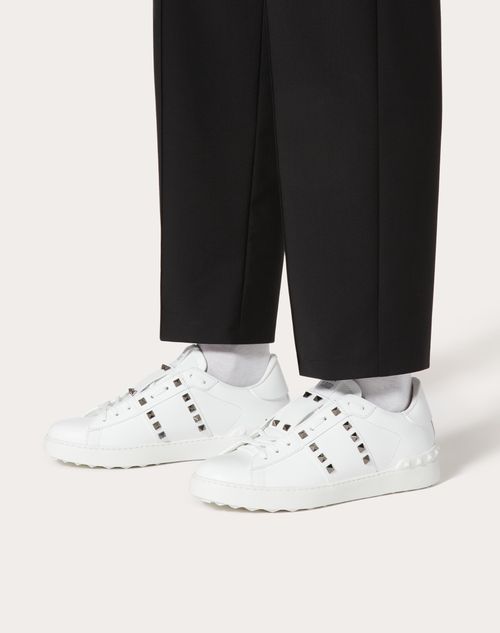 rockstud untitled sneaker in calfskin leather with metallic stripe