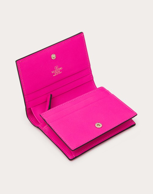 valentino rockstud wallet pink