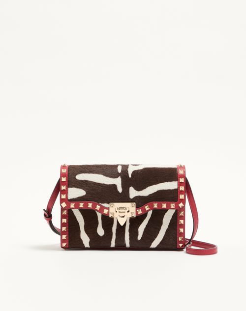 Valentino Garavani - Valentino Garavani Rockstud Small Shoulder Bag In Pony-effect Calfskin - White/marrone/red - Woman - Shoulder Bags