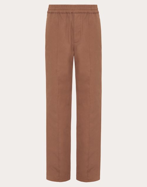 Valentino - Stretch Cotton Canvas Trousers With Rubberised V Detail - Clay - Man - Trousers And Shorts