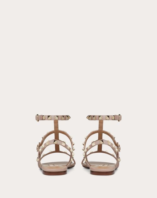 ROCKSTUD FLATFORM SANDAL IN BLACK CALFSKIN