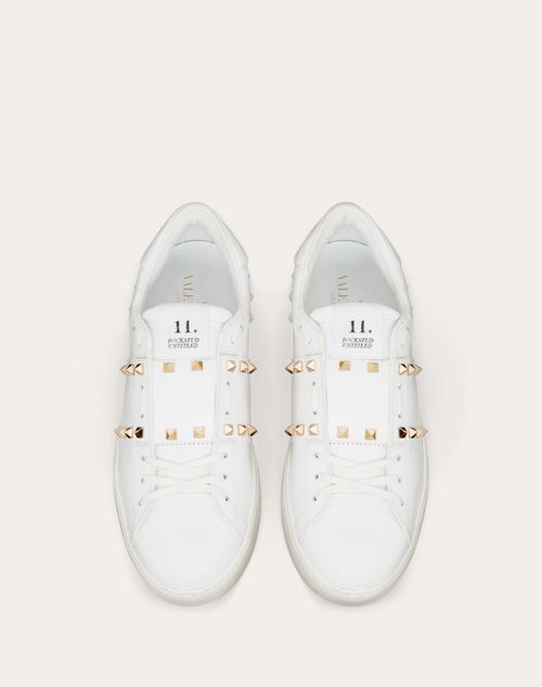 Calfskin Rockstud Untitled Sneaker for Man in White Calfskin Rockstud Untitled Sneaker for Man in White