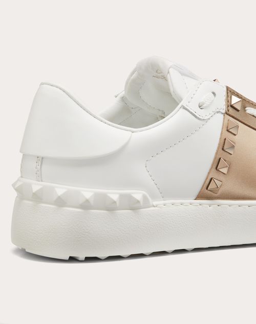 rockstud untitled sneaker in calfskin leather with metallic stripe