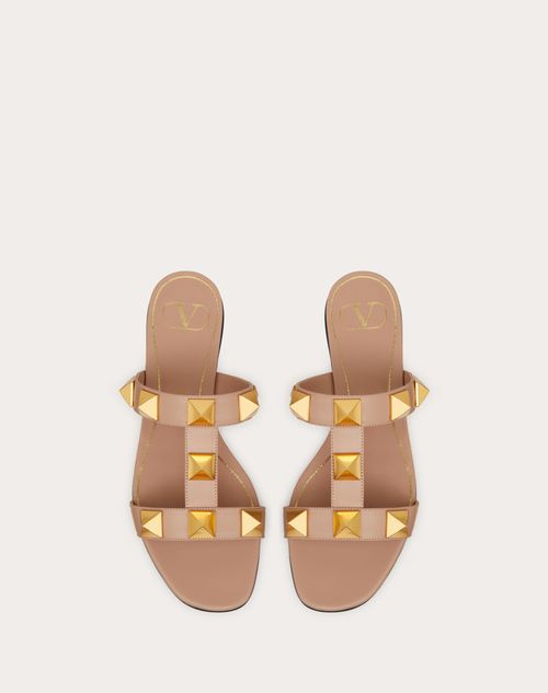 Flat Roman Stud Calfskin Slide Sandal for Woman in Black | Valentino US