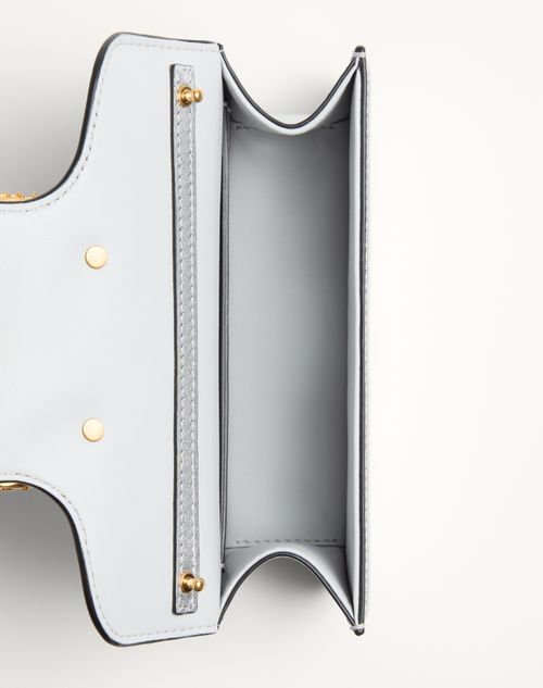 Valentino Garavani - Valentino Garavani Locò Small Shoulder Bag In Laminated Calfskin With Jewel Logo - Silver - Woman - Shoulder Bags
