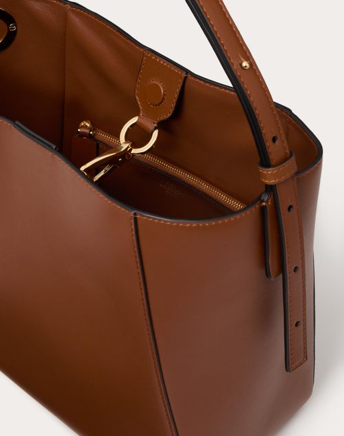 Vロゴ サイド ナッパレザー カーフスキン バケットバッグ for ウィメンズ インチ アイボリー | Valentino JP