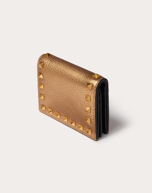 Small Rockstud Metallic Calfskin Wallet for Woman in Antique Brass | US