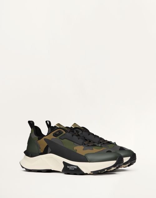 Valentino Garavani - Low Top True Act Camouflage Sneaker In Rubberized Fabric - Military Green - Man - Sneakers