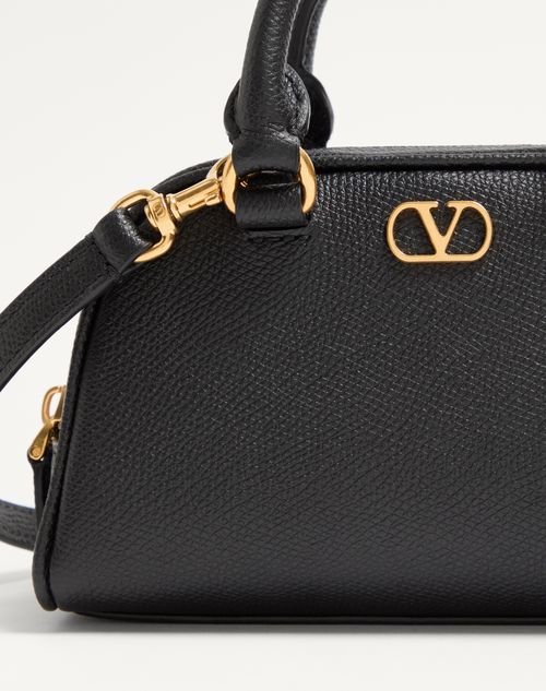 Valentino Garavani - Vlogo Signature Mini Bowling Bag In Grainy Calfskin - Black - Woman - Shoulder Bags