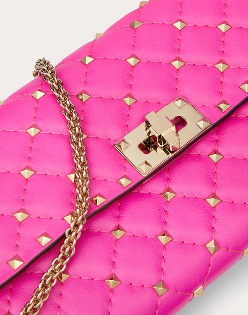 Rockstud Spike Nappa Leather Crossbody Clutch Bag for Woman in Pink Pp