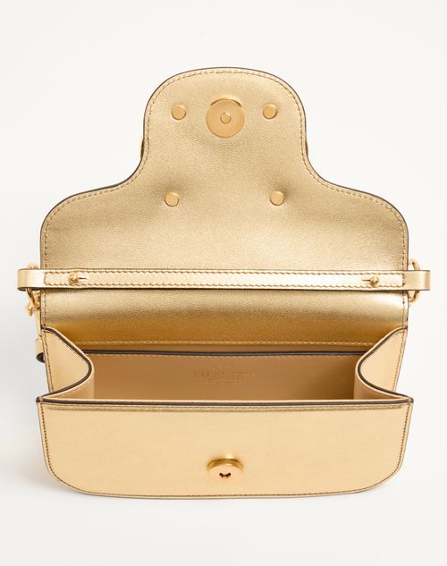 Valentino Garavani - Valentino Garavani Locò Small Shoulder Bag In Laminated Calfskin With Jewel Logo - Antique Brass - Woman - Shoulder Bags