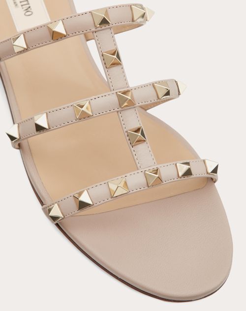 Rockstud Flat Slide Sandal for Woman in Poudre | Valentino GB