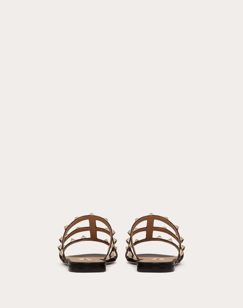 Rockstud Flat Slide Sandal for Woman in Poudre | Valentino GB
