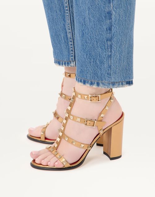 Valentino Garavani - Rockstud Laminated Calfskin Sandal With Straps 90mm - Gold - Woman - Sandals